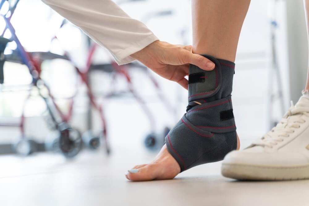 Woman wearing an ankle brace during a fitting
